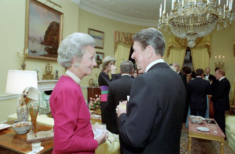 9/30/1985 President Reagan and Katherine Graham talking at a private dinner for Prince Franz Josef II and Princess Gina of Liechtenstein in yellow oval room